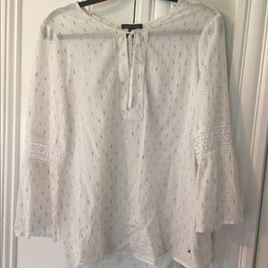 White blouse with gold detailing